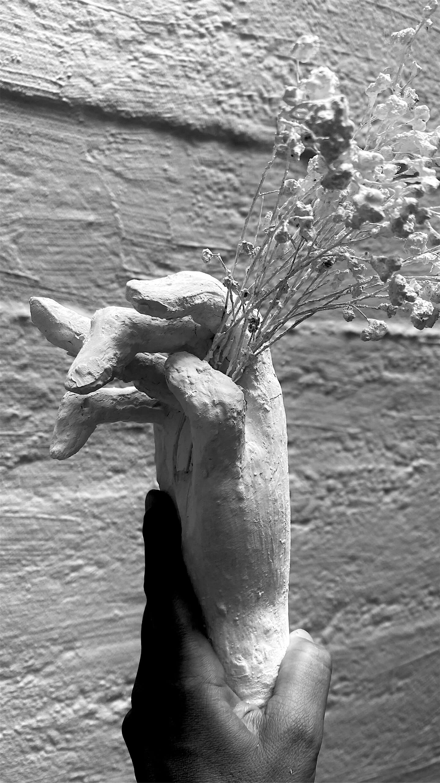 Hand and Blossom, 2022, plaster, object